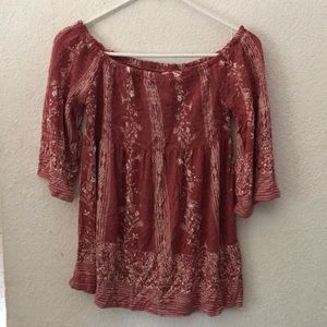 Off-shoulder rose color shirt